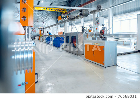 Inside the new factory manufacturing electrical cable. Cable production. Inside the new factory manufacturing electrical cable. Cable production. 76569031