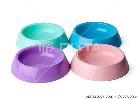 New plastic pet bowl isolated on white New plastic pet bowl isolated on white 76570559