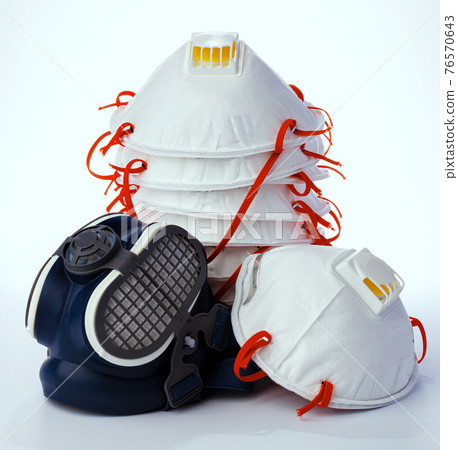 Stack of medical masks on white background 76570643