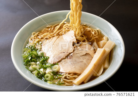 Simple soy sauce ramen on a black background 76571621