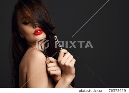 Portrait of sensual naked woman cosmetologist with Portrait of sensual naked woman cosmetologist with 76572639