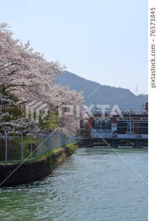 Scenery near the intake gate from the Seta River to the Uji power plant Scenery near the intake gate from the Seta River to the Uji power plant 76573845