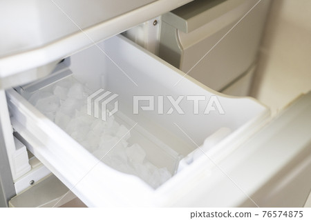 Ice in the freezer Ice in the freezer 76574875