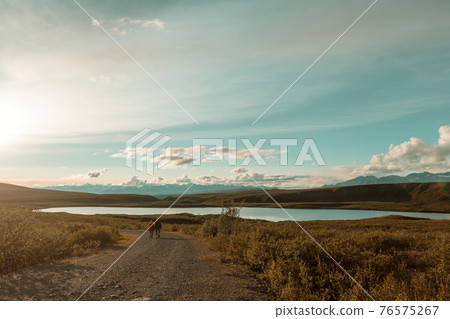 Couple in mountains 76575267