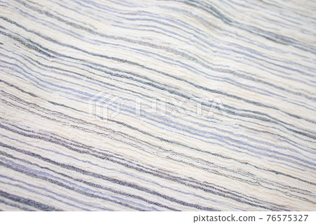 Fabric backdrop White linen canvas crumpled natural cotton fabric Natural handmade linen top view background Organic Eco textiles White Fabric texture 76575327