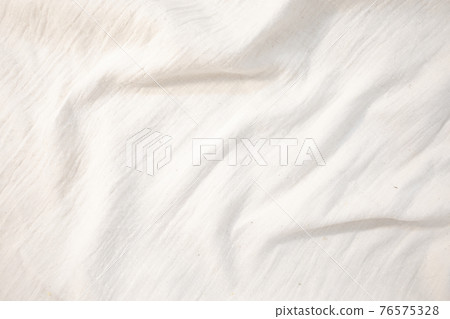 Fabric backdrop White linen canvas crumpled natural cotton fabric Natural handmade linen top view background Organic Eco textiles White Fabric texture Fabric backdrop White linen canvas crumpled natural cotton fabric Natural handmade linen top view background Organic Eco textiles White Fabric texture 76575328
