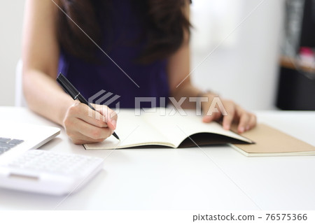 Online studying class for E learning. Smart student girl sitting at table watching lesson online and studying from home. Stay home stay safe Online studying class for E learning. Smart student girl sitting at table watching lesson online and studying from home. Stay home stay safe 76575366