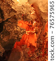 Burnt paper ash in the oven. 76575965