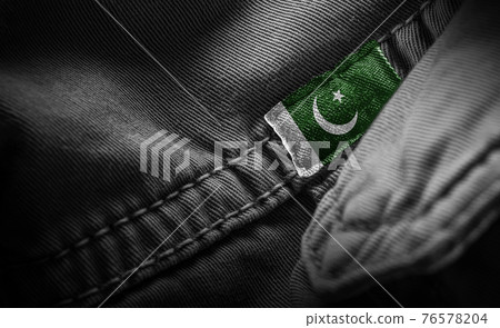 Tag on dark clothing in the form of the flag of the Pakistan Tag on dark clothing in the form of the flag of the Pakistan 76578204