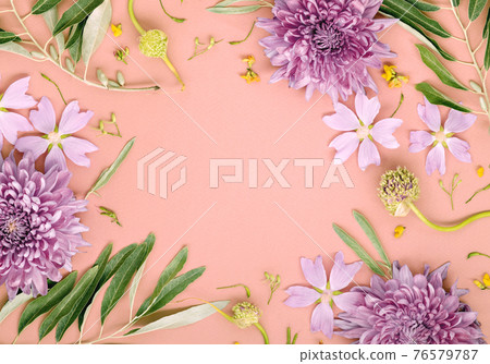 Summer flowers and leaves frame in pink tones. 76579787