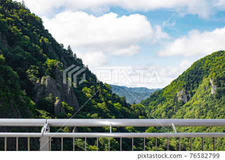 High ground with a view of the mountains High ground with a view of the mountains 76582799