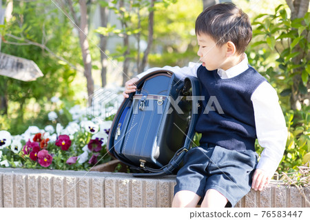 Boys entering elementary school 76583447