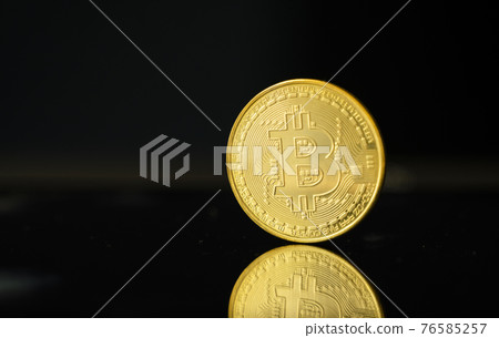 Gold bitcoin coin. Trading on the cryptocurrency exchange. Cryptocurrency Stock Market Concept. Virtual money concept. Mining or blockchain technology. Gold bitcoin coin. Trading on the cryptocurrency exchange. Cryptocurrency Stock Market Concept. Virtual money concept. Mining or blockchain technology. 76585257
