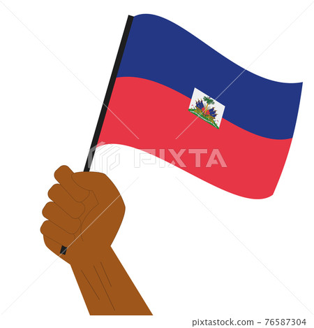 Hand holding and raising the national flag of Haiti Hand holding and raising the national flag of Haiti 76587304