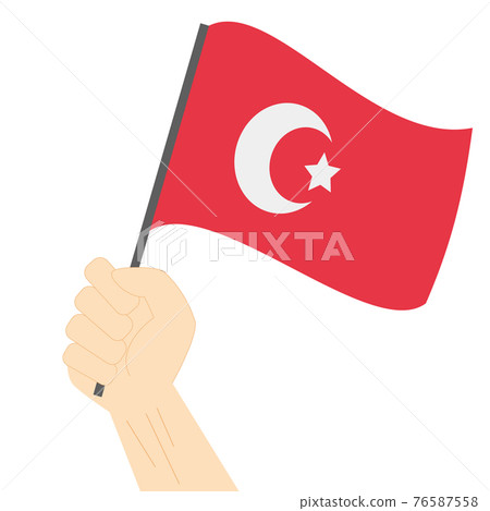 Hand holding and raising the national flag of Turkey Hand holding and raising the national flag of Turkey 76587558