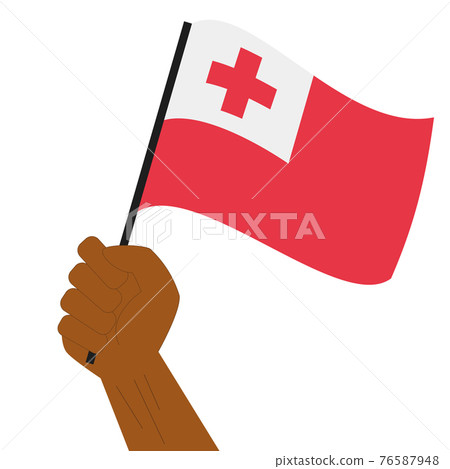 Hand holding and raising the national flag of Tonga Hand holding and raising the national flag of Tonga 76587948
