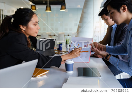 Group of Businessman and Accountant checking data document on digital tablet for investigation of corruption account . Anti Bribery concept. 76588931