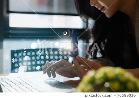 Online Shopping. Asian woman typing credit card information by smartphone keyboard for shopping online. Online Shopping. Asian woman typing credit card information by smartphone keyboard for shopping online. 76589030