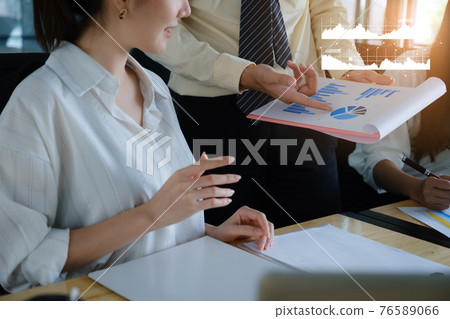 Fund managers team consultation and discuss about analysis Investment stock market by digital tablet. Fund managers team consultation and discuss about analysis Investment stock market by digital tablet. 76589066