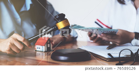 Business woman and lawyers discussing contract papers on wooden desk in office. Law, legal services, advice, Justice concept. 76589126