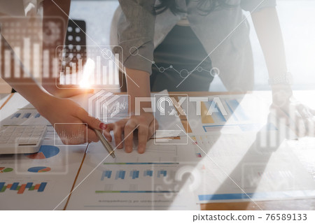 Asian accountant marketing team consultants and using calculator to analyze sales growth in the global workplace market. accounting concept 76589133