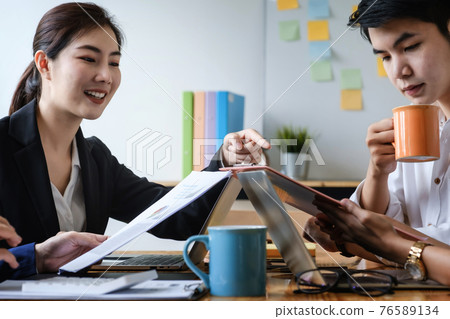 Group of Businessman and Accountant checking data document on digital tablet for investigation of corruption account . Anti Bribery concept. selecetive focus 76589134