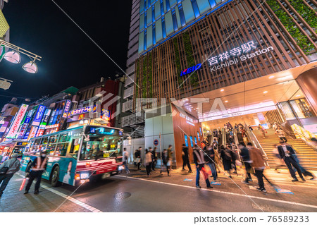 Tokyo cityscape of Japan in front of Kichijoji station. Buses are constantly in front of the station = April 12 76589233