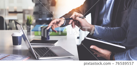 Group of Businessman and Accountant checking data document on digital tablet for investigation of corruption account . Anti Bribery concept. Group of Businessman and Accountant checking data document on digital tablet for investigation of corruption account . Anti Bribery concept. 76589557