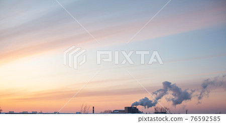 White thick smoke from the boiler room chimney. Industrial zone. White thick smoke from the boiler room chimney. Industrial zone. 76592585