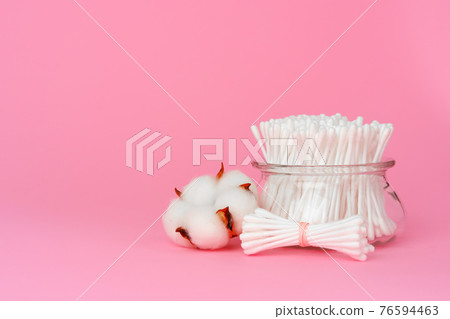 Hygienic cotton ear buds in glass cup Hygienic cotton ear buds in glass cup 76594463