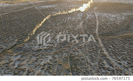 Morning time drone view hot springs on the desert valley 76597173