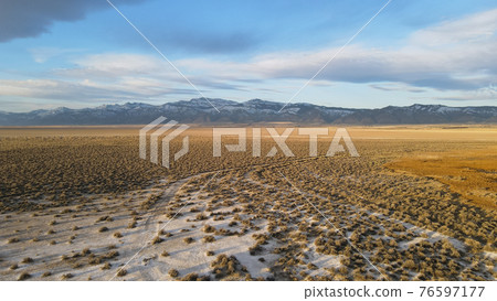 Snow mountains with hot springs on the surprise valley Snow mountains with hot springs on the surprise valley 76597177