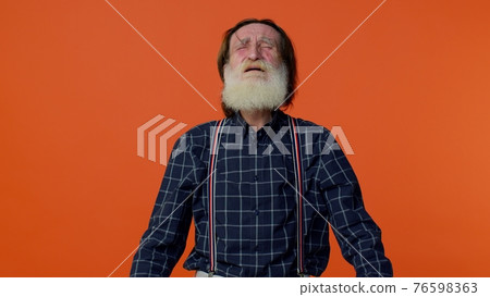 Frustrated elderly bearded man screams from stress tension problems feels horror hopelessness fear Frustrated elderly bearded man screams from stress tension problems feels horror hopelessness fear 76598363