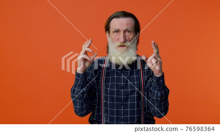 Senior old bearded man wish for good luck waiting lottery winning, great fortune, celebrating, happy Senior old bearded man wish for good luck waiting lottery winning, great fortune, celebrating, happy 76598364