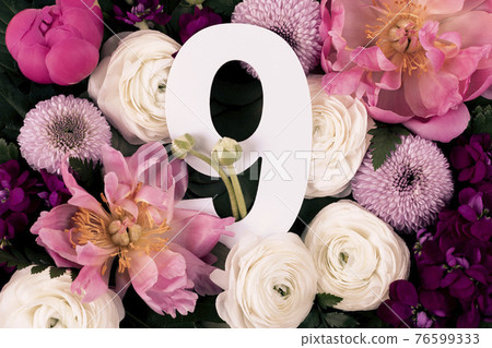 Colorful flowers, leaves and number nine 76599333