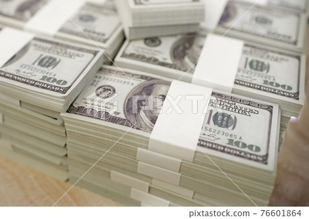 American Dollars Cash Money. One Hundred Dollar Banknotes. Stack of one hundred dollar bills .shallow focus effect. 76601864