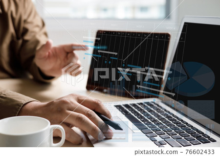 Businessman working project and update Gantt Software Chart scheduling virtual diagram and progress planning quality and communication gantt on virtual screen Businessman working project and update Gantt Software Chart scheduling virtual diagram and progress planning quality and communication gantt on virtual screen 76602433