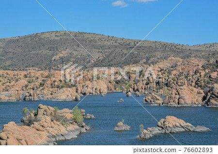 Lake Watson has picturesque, exposed granite bedrock with bright blue water. Located in Prescott, Yavapai County, Arizona  76602893
