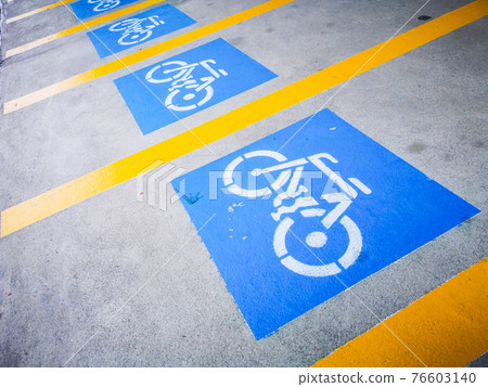 The symbol for bicycle parking. Bicycle parking. Organizing public spaces and increasing the attractiveness of cycling. soft focus.. 76603140