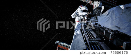 Astronaut spaceman do spacewalk while working for space station 76606176