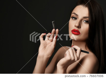 Portrait of wealthy naked luxury woman with red 76607006