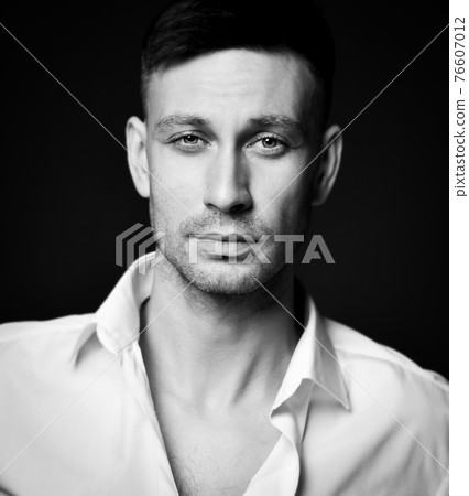 Black and white portrait of calm friendly brunette Black and white portrait of calm friendly brunette 76607012