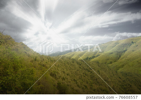 Green hills with landscape view Green hills with landscape view 76608557