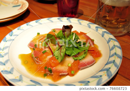 Fresh yellowtail carpaccio 76608723