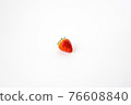 One strawberry on a white background 76608840