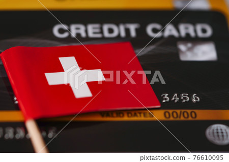 Switcherland flag on credit card Switcherland flag on credit card 76610095