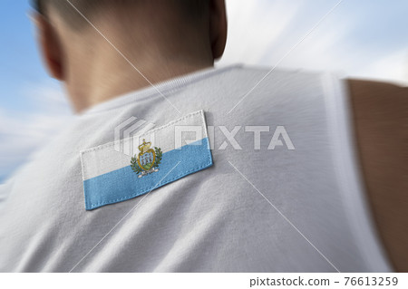 The national flag of San Marino on the athlete's back The national flag of San Marino on the athlete's back 76613259