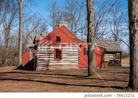 Colonial log cabin and red wood frame house Colonial log cabin and red wood frame house 76615231