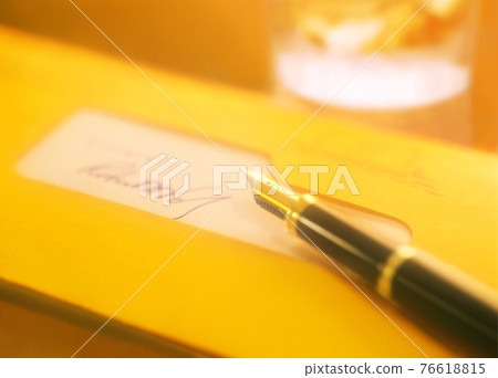 Fountain pen and letter 76618815