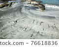 Sandy beach with ripples 76618836